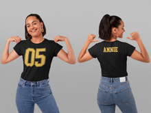 Load image into Gallery viewer, Sport theme t-shirt, Sport Numbers, sport tee, gold letters

