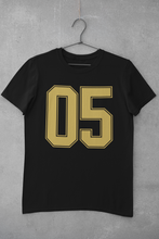 Load image into Gallery viewer, Sport theme t-shirt, Sport Numbers, sport tee, gold letters
